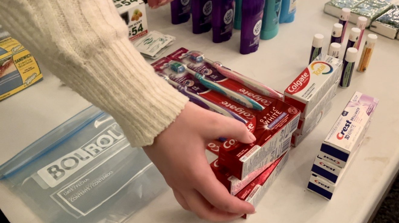 Setting down toothpaste