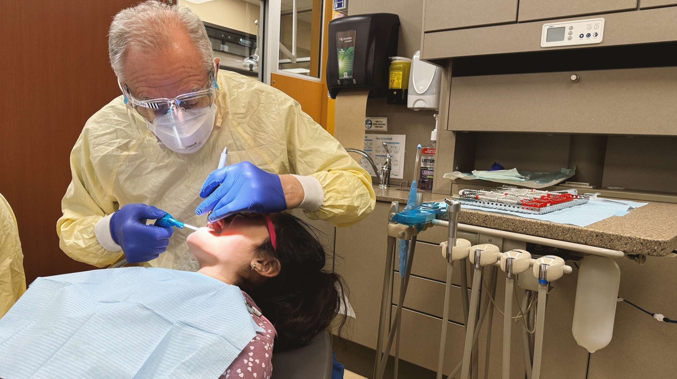 Dentist working on a young patient